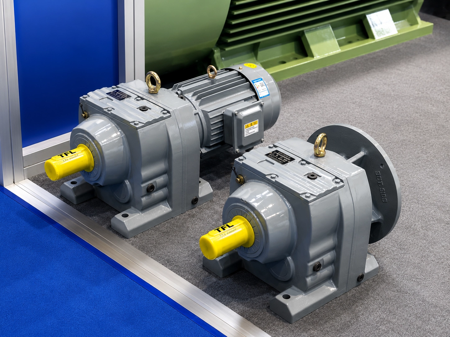 Heavy industrial gearbox and reducer assembly in a workshop